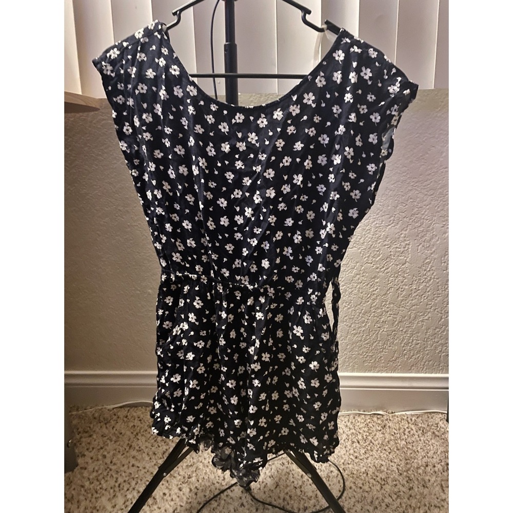 Floral short romper, white and navy blue. Ties in the back.